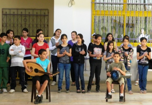 Palestinian children enjoy making music.