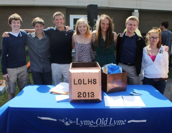 Local History Club members gather for a photo in front of the time capsule.