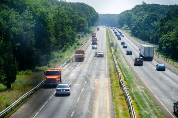 Emergency crews conduct clean-up operation on I-95 southbound following tractor-trailer fire.