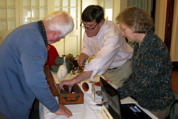 (Photo by Skip Hubbard) Norman and Linda Legassie of Old Lyme have been the proprietors of Stepping Stones Antiques and Collectibles in Old Saybrook since 1976. A professional sculptor, Norman’s knowledge of fine art brings a practiced eye to examine treasures. Linda adds many years of experience as a researcher in the fine and decorative arts. Their knowledge encompasses a wide range of subjects from prehistoric to present, including furniture, jewelry, postcards, tools, silver, pottery, and more. Norman is a Senior Professional Appraiser (SPA) with the National Association of Professional Appraisers. They will lend their considerable expertise as appraisers to the Chester Historical Society’s Antiques & Jewelry Appraisal on Saturday, Nov. 9 in Chester. Info: www.ChesterHistoricalSociety.org. 