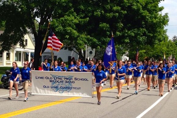 The Lyme-Old Lyme High School proudly leads the parade.