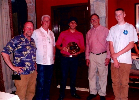Celebrating Erick's  award are, from left to right, Bob Morin, member of the Lyme Fire Company and fiance of Robin Courtney, Erick's host mother; Jamie Leatherbee, 1st Assistant Chief of Hamburg; Erick Saenz; Tom Brown, Fire Chief; and Austin Courtney, member of the Lyme Fire Company and Erick's host brother.