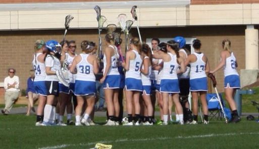 Sticks high. The Old Lyme girls get ready for their game against Weston this afternoon.