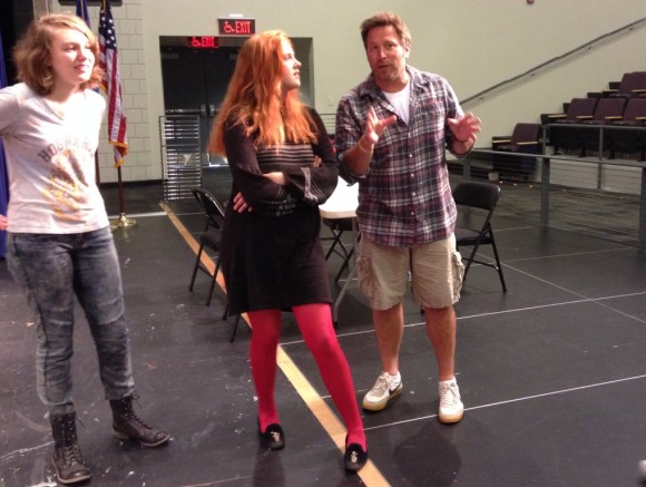 Director and history teacher Brett Eckhart gives instruction to cast members during a recent rehearsal for "Letters to Sala."