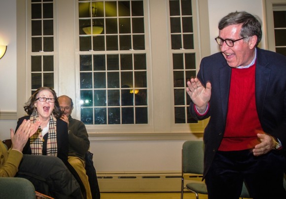 The moment of truth -- a thrilled Lynn Fairfield-Sonn shows her surprise  at the announcement while husband Jim Fairfield-Sonn (right - who was in on the secret) leaps to his feet in delight. 