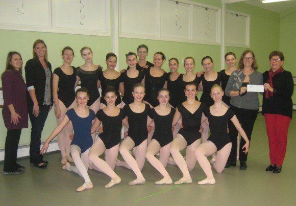 Chris Kitchings, owner of The Bowerbird (back row, second from left) presents a check to the Eastern Connecticut Ballet.
