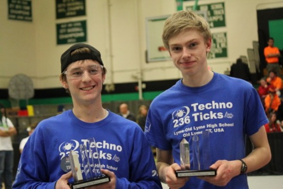Drive Team member Nate Bersing and Scouting Captain Tom Crisp collect the Motorola Quality Award on behalf of the team.