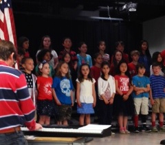 Mile Creek students sing during the Memorial Day program. 
