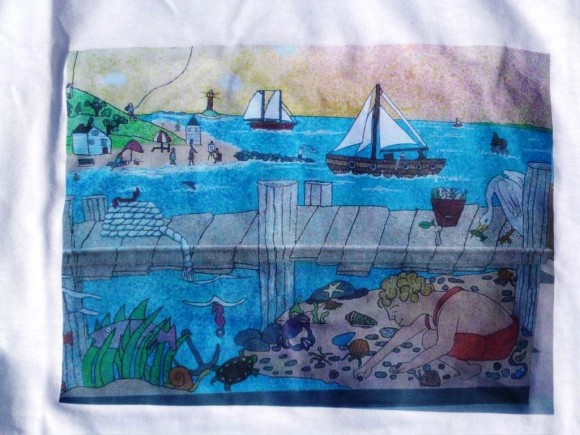 A T-shirt presented to the students showing the mural inside the front lobby of Center School.