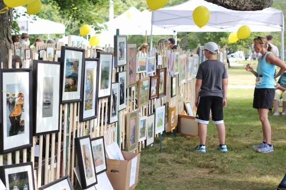 Enjoy the artwork of the 'Plein Air' artists in front of Center School.