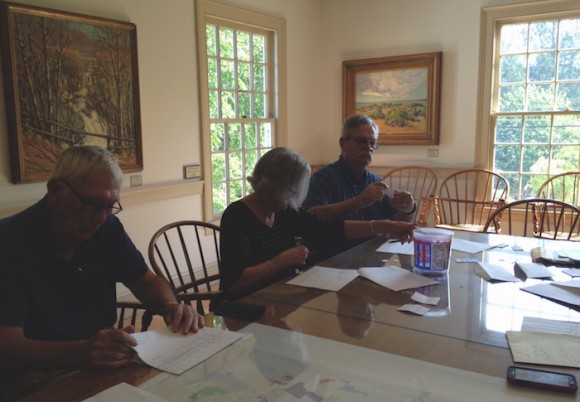 Old Lyme Republican Registrar Don Tapper reads the name of the candidate drawn in the lottery for placement on the ballot. Old Lyme Democratic Registrar Sylvia Peterson to his left notes the candidate's name.