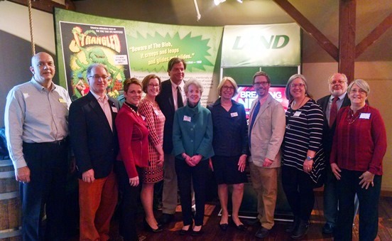 Sponsors of the exhibit gathered for a sneak peek prior to the Invaders: They Come by Air, Land and Water exhibit opening at the Connecticut River Museum. From left to right are: John Lombardo, Stephen Tagliatela, and Viola Tagliatela from Saybrook Point Inn and Spa; Thayer Talbot from the Community Foundation of Middlesex County; Representative Phil Miller; Cynthia Clegg from the Community Foundation of Middlesex County; Joanne Masin and Christopher Dobbs from the Connecticut River Museum; Brenda Kestenbaum from Eyewitness News (WFSB); and Tony Marino and Marilyn Ozols from the Rockfall Foundation.