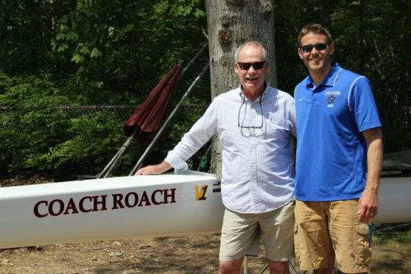 Rob Roach stands with LOLHS Varsity Coach Louis Zubek by the 'Coach Roach.'