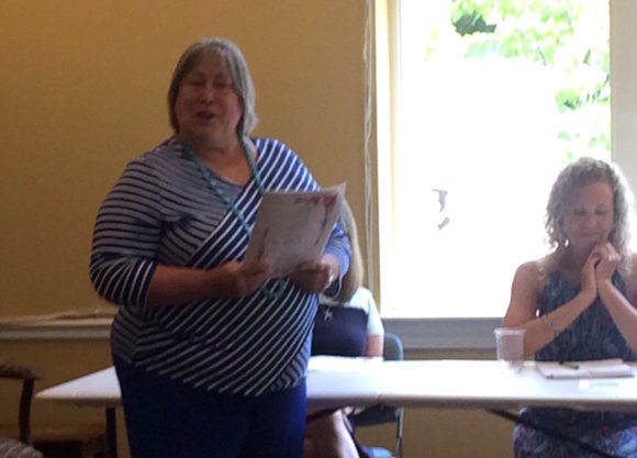 Ann Roy read a self-composed poem honoring the two outgoing Library directors.