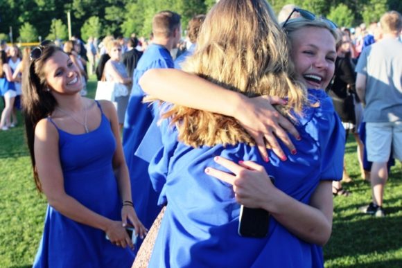 Hugs were happening everywhere after the ceremony was over. This one was between Sophia Romeo and 