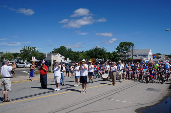 The Silver Cornet Band played the national anthem at the Hartford Ave. flagpole.