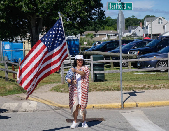 Joann_Leishing_with_flag