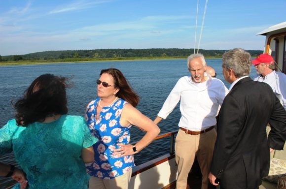 Enjoying a boat ride on the Connecticut River but still deep in discussion are (from left to right) Chester First Selectwoman Lauren Gister, Old Lyme First Selectwoman and and Connecticut Port Authority (CPA) Board Member Bonnie Reemsnyder, Essex First Selectman Norm Needleman, CPA Chairman Scott Bates and Deep River First Selectman Angus McDonald, Jr.