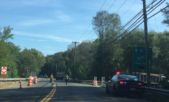 Old Lyme Police patrol the currently closed entrance to the I-95 south bound on-ramp at Exit 71 on Four Mile River Rd.