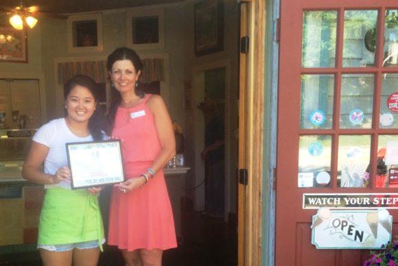 The Old Lyme Ice Cream Shoppe receives its Certificate of Appreciation from the Children's Library for supporting the Summer Reading program.