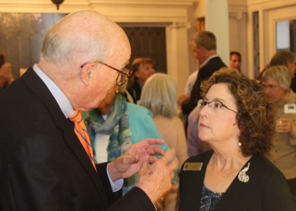 John Forbis gives his good wishes to Mary at the event.