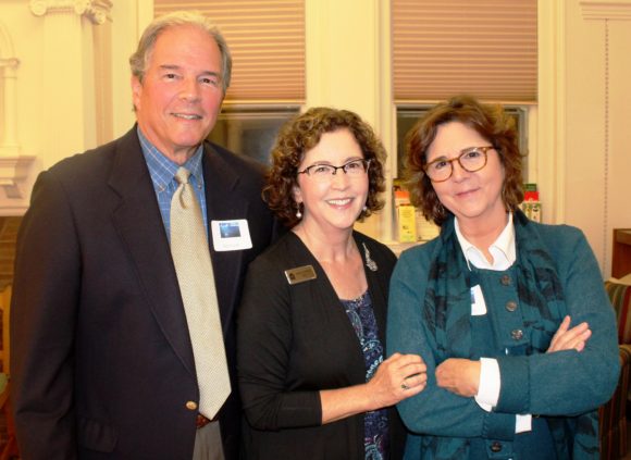 A smiling Mary Fiorelli (center) stands with her siblings.