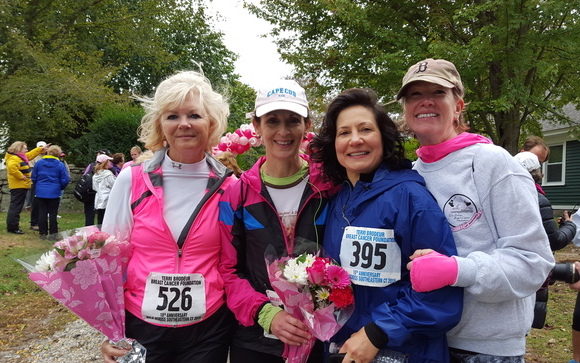 Shelley Gregory (right) is often joined by friends on her fundraising walk -- and will be again this year. Julie Edmundsen stand to Shelley's left after completing the walk last year.