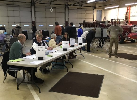 Election workers hard at work in the Old Lyme Polling Station at Cross lane Firehouse. Photo by L. Peterson.
