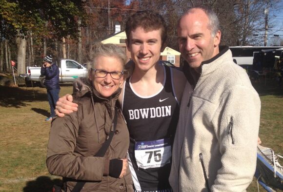 Nick stands with his parents, Cary and David Walker of Lyme, after a recent race.