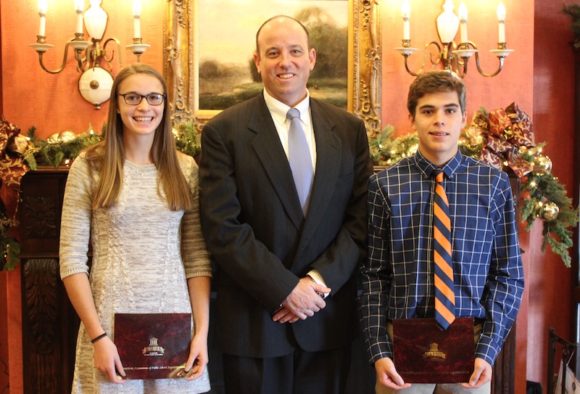 Lyme-Old Lyme Schools Superintendent Ian Neviaser stands with the two winners of the CAPPS awards from Lyme-Old Lyme High School., Cayleigh O'Neil and Graham Aird.